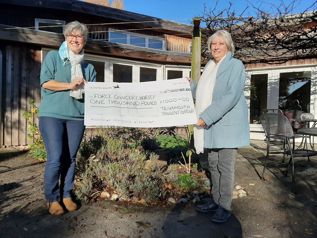 Gerry Willocks presents a cheque to Sarah Daniels