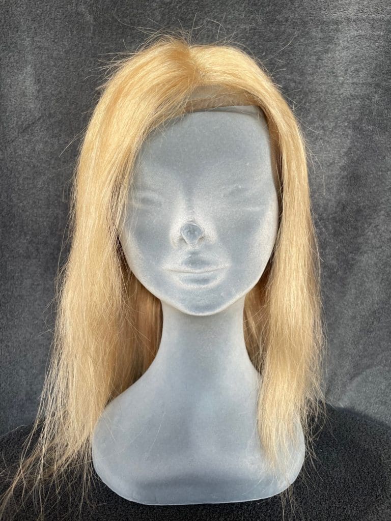 Blonde wig with a lace wig cap 077