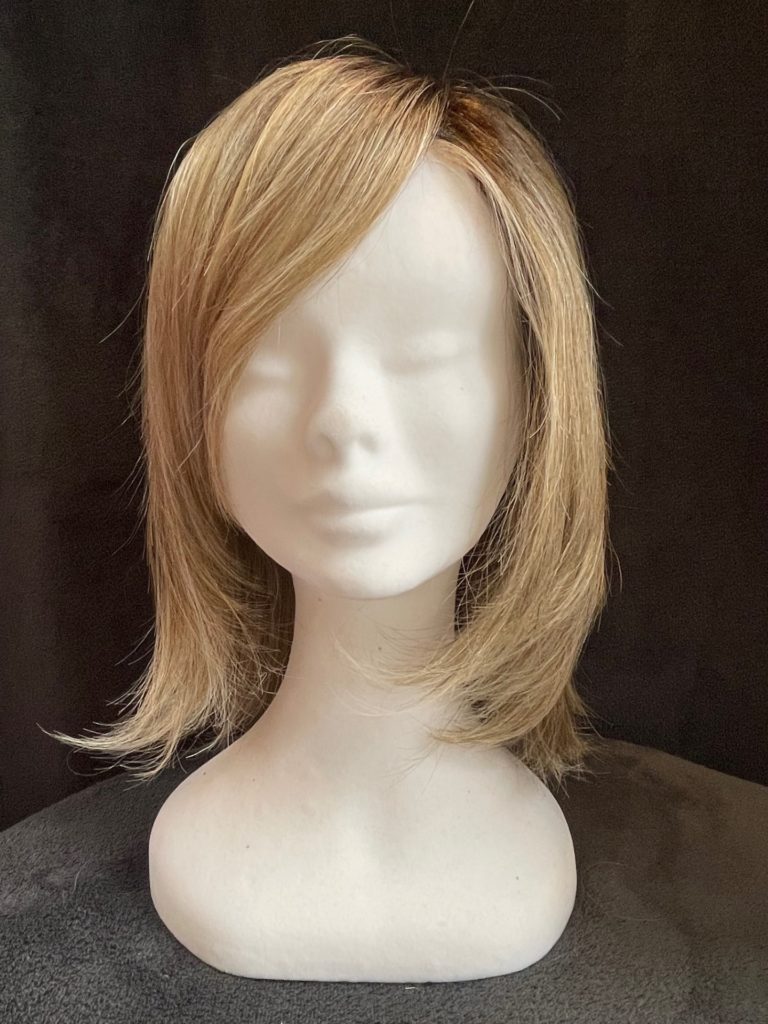 Blonde with a monofilament crown wig cap