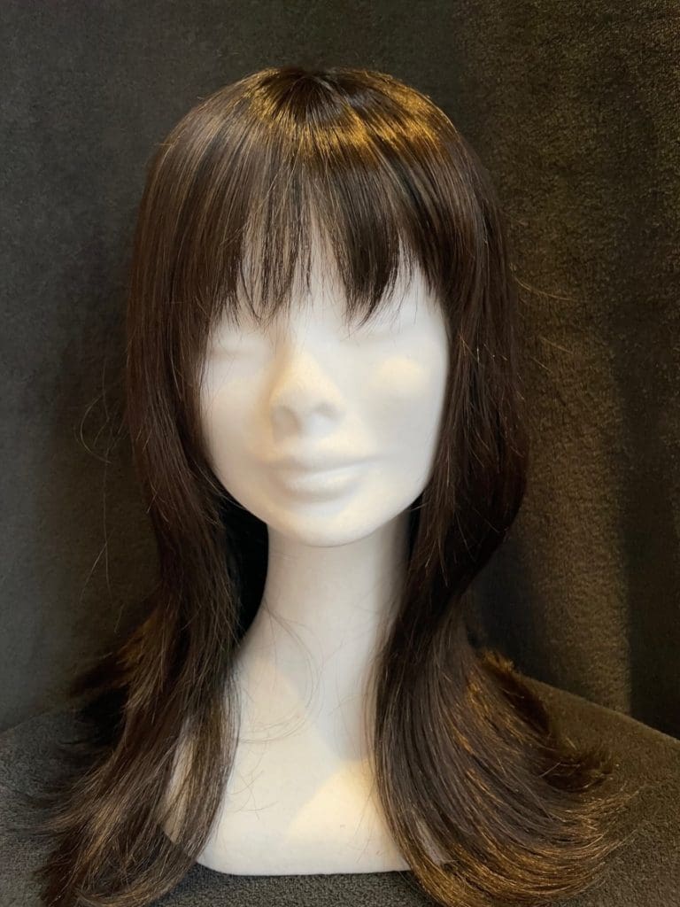 Black with a monofilament wig cap 052