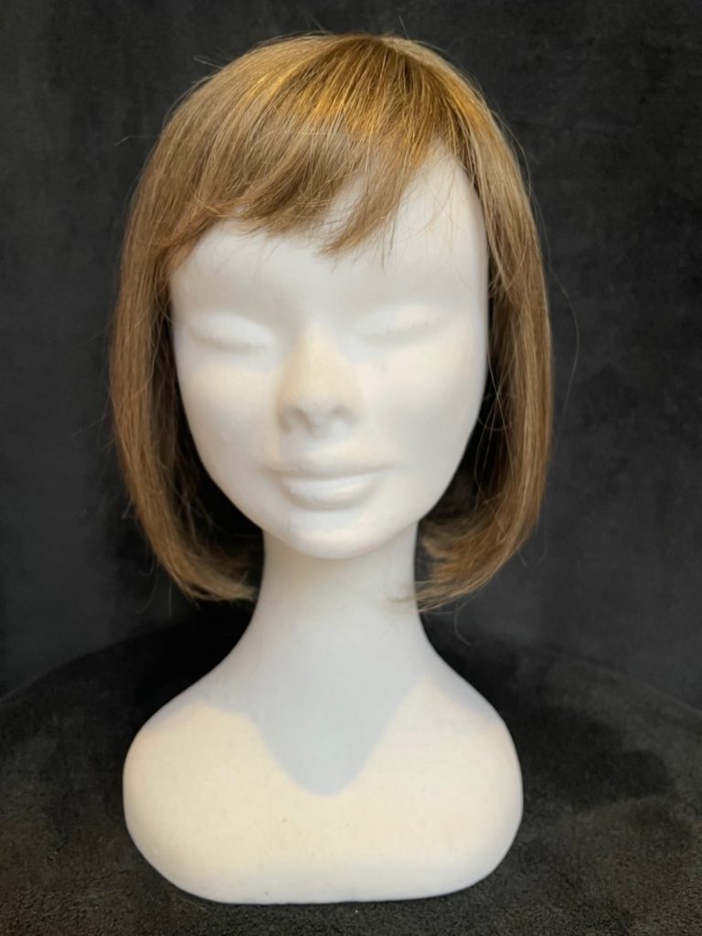 Brown with a basic wig cap