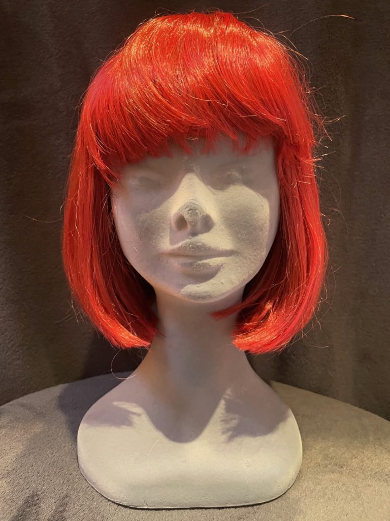 Bright red with a basic wig cap