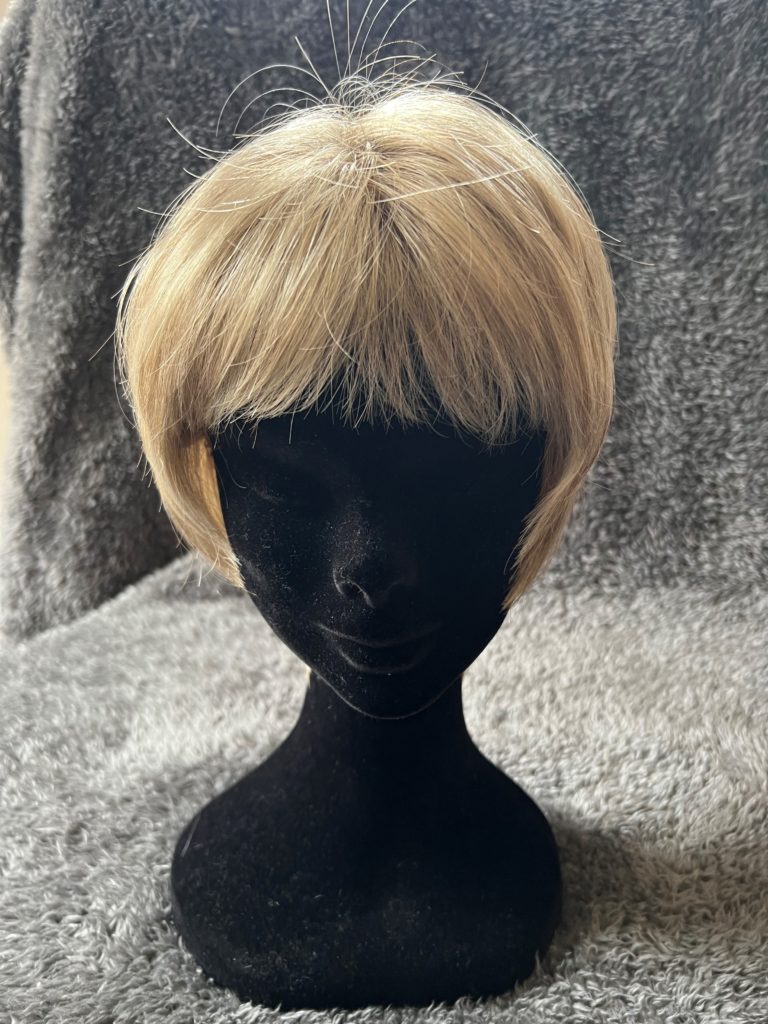 Blonde with a lace wig cap