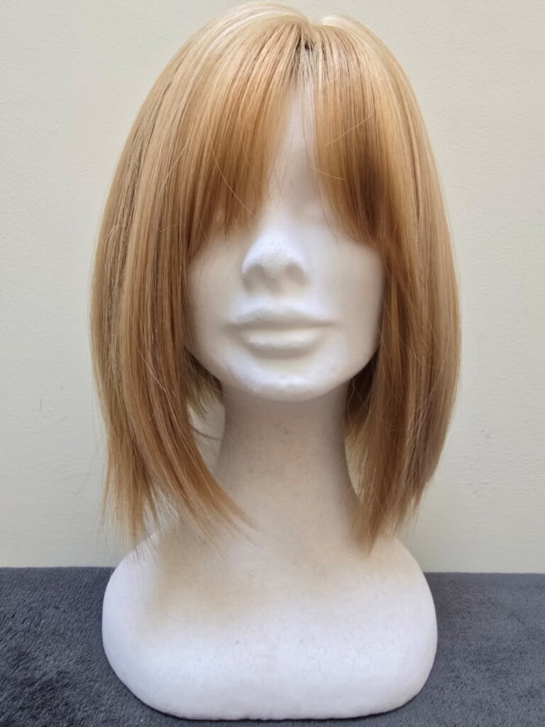 Blonde with a Basic Cap and Monofilament Parting Wig No. 419