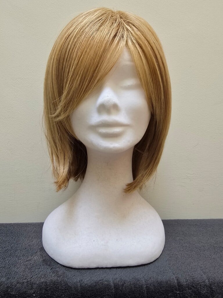 Blonde with a Basic Cap and Monofilament Parting Wig No. 439