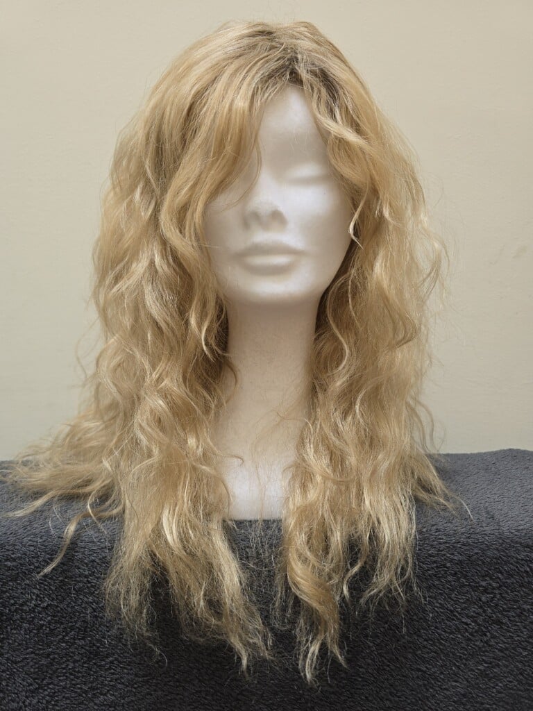 Blonde with a Basic Cap and Monofilament Top Wig No. 554