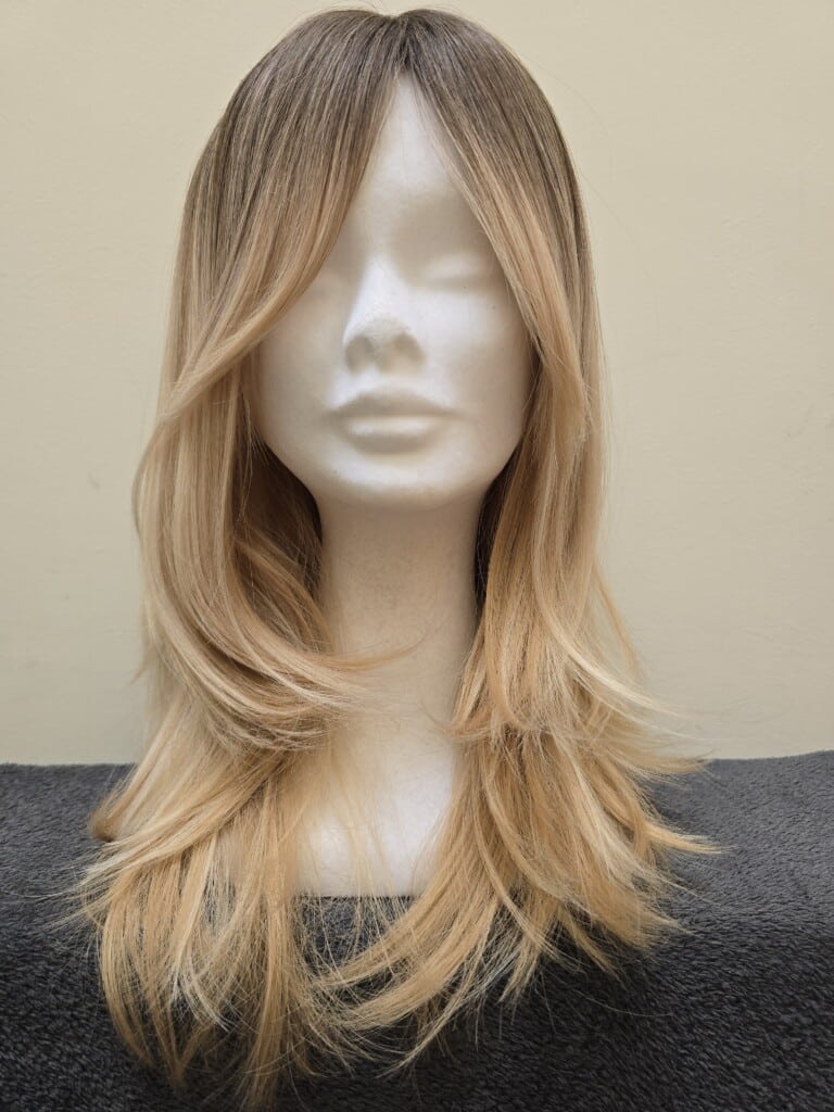 Blonde with a Basic Cap and Monofilament Parting Wig No. 559