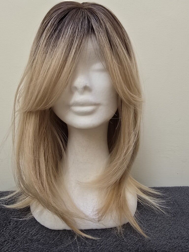 Blonde with a Basic Cap and Monofilament Parting Wig No. 561