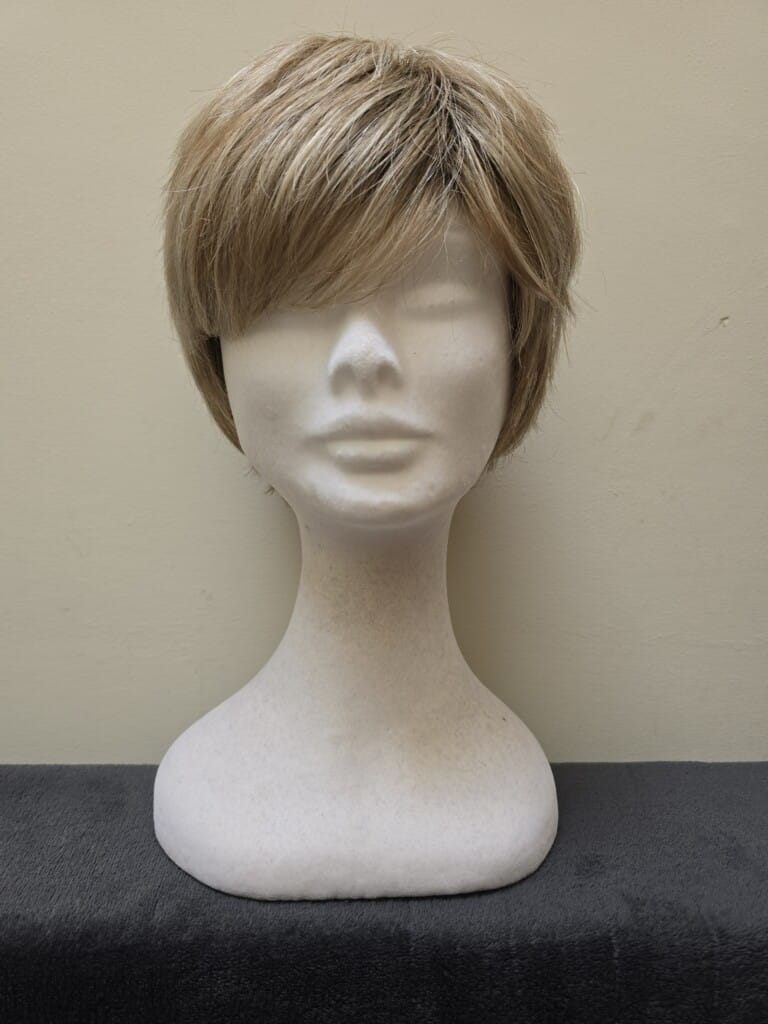 Blonde with a Basic Cap and Monofilament Top Wig No. 573