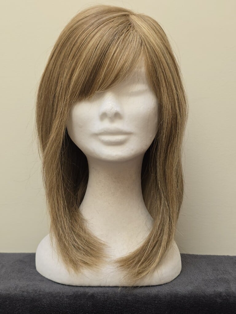 Blonde with a Basic Cap and Monofilament Top Wig No. 599